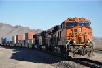 Westbound stack train climbs the grade